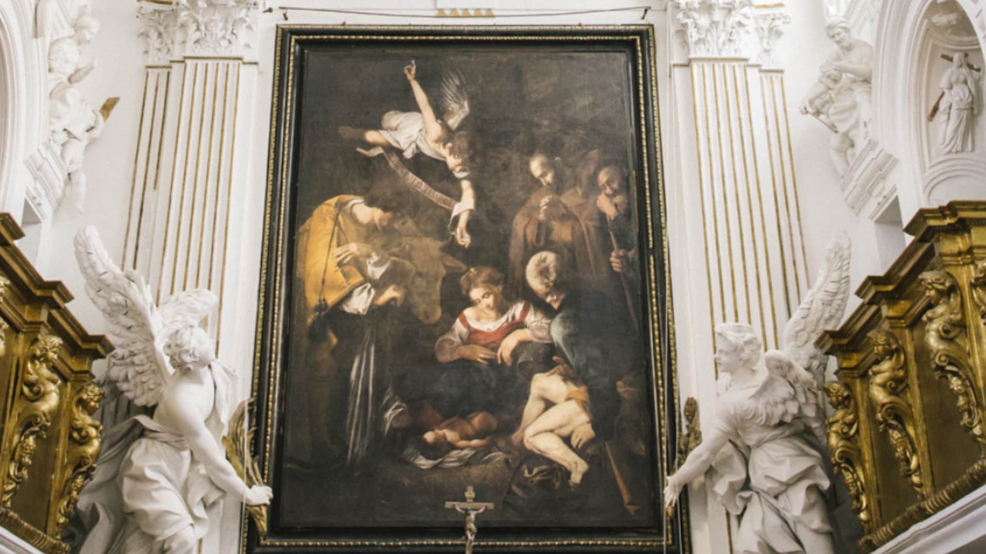Natività con i Santi Lorenzo e Francesco, Caravaggio, riproduzione del dipinto realizzato nel 1600 circa, olio su tela 268 x 197 cm. e sottratto nel 1969 nell'Oratorio di San Lorenzo, Palermo. Credito: Gianni Cipriano/The New York Times