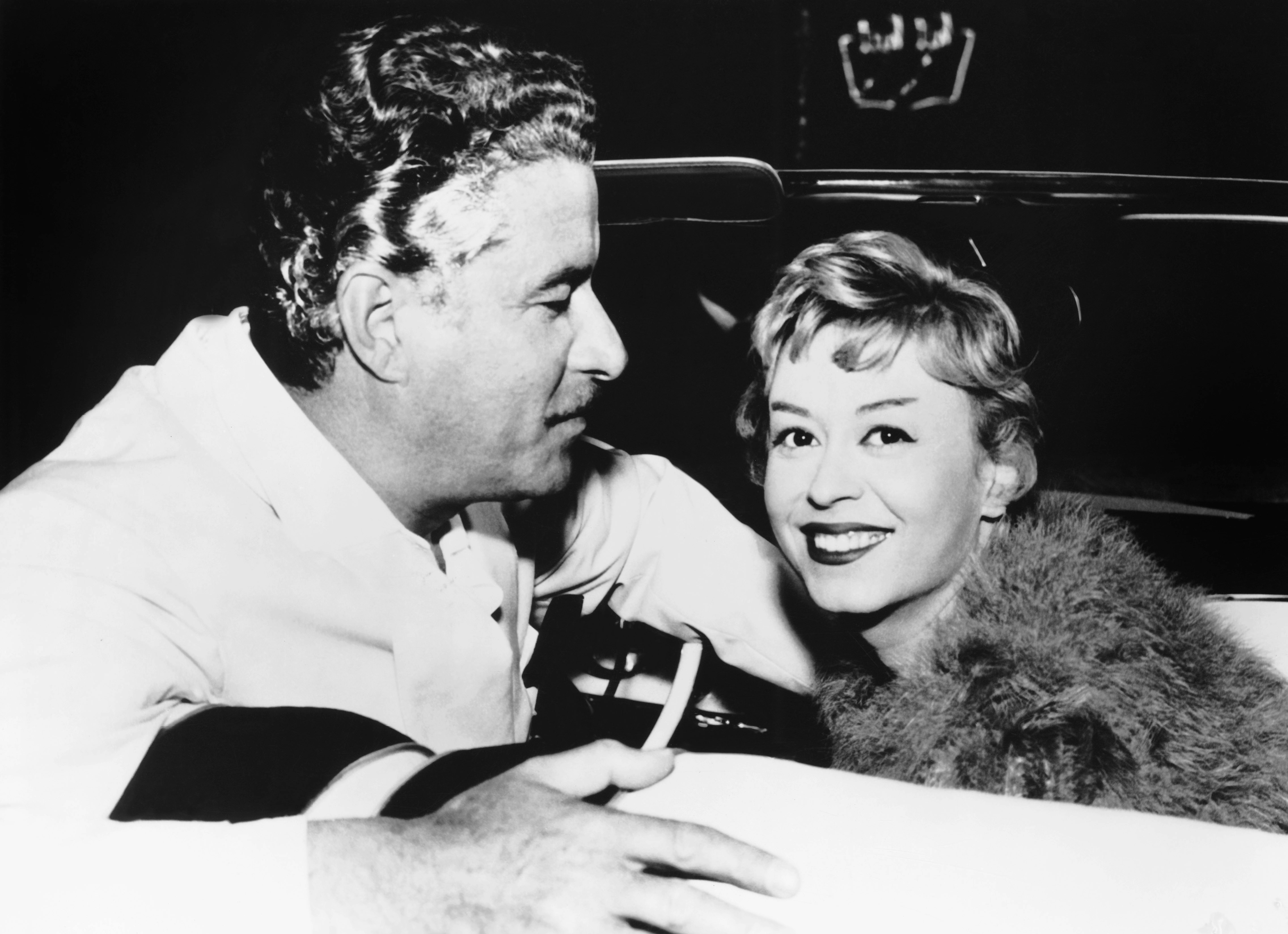 Sul set di "Le notti di Cabiria", 1957. Con l'attore Amedeo Nazzari